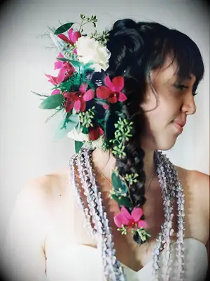 wedding hair flowers oversize blooms in braid