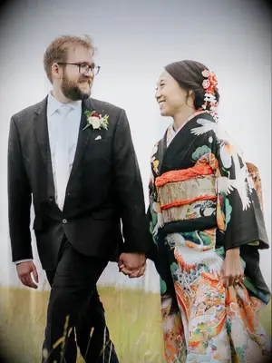 wedding hair flowers low bun with colorful florals