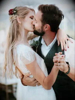 wedding hair flowers braided half up with wildflowers