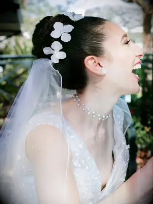 wedding hair flowers top knot with flower halo
