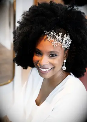 Afro with crystal accessory Black wedding hairstyle