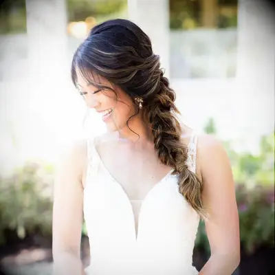 Loose french fishtail braid wedding hairstyle