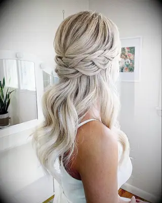 Half up braided halo wedding hairstyle