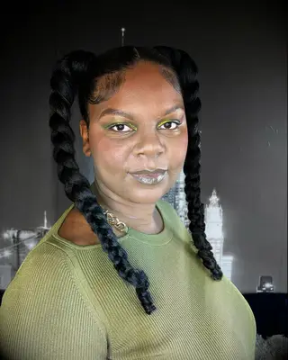 Briaded ;pigtails with edges wedding hairstyle