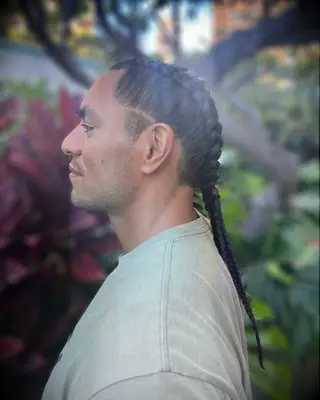 Dual dutch braids groom wedding hairstyle