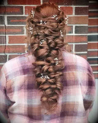 Mermaid Braid with Topsy-Tail Twists wedding hairstyle