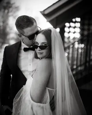 Sleek straight hair short wedding hairstyle with veil