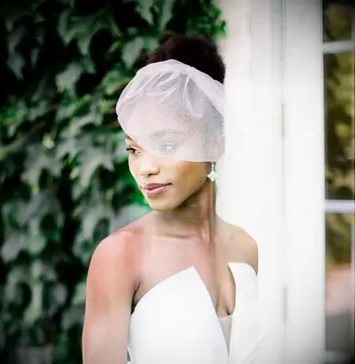 Wedding updo for short hair with birdcage veil