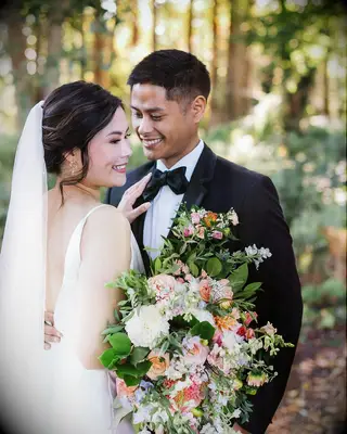 Wedding side bun hairstyle for short hair with veil