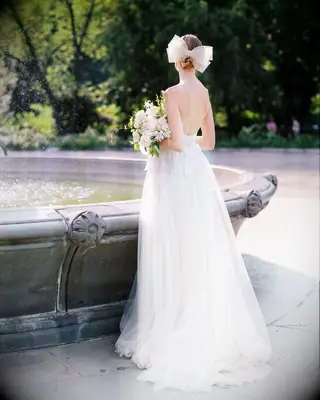 Wedding updo for short hair with bow
