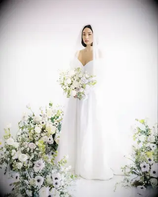 Sleek bob wedding hairstyle for short hair with veil