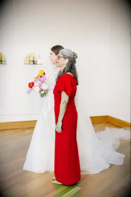 Half up mother of the bride hairstyle for long hair