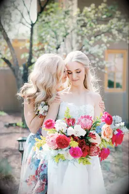 Long hair loose curls mother of the bride hairstyle