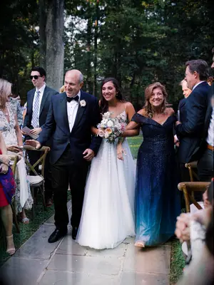 Half up medium length mother of the bride hairstyle 