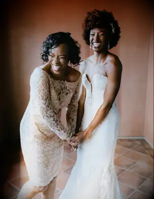 Glamorous curly mother of the bride short hairstyle