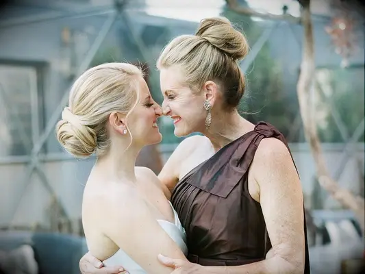 Top knot elegant mother of the bride hairstyle