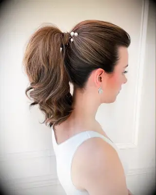 Wedding ponytail with pearls for medium length hair