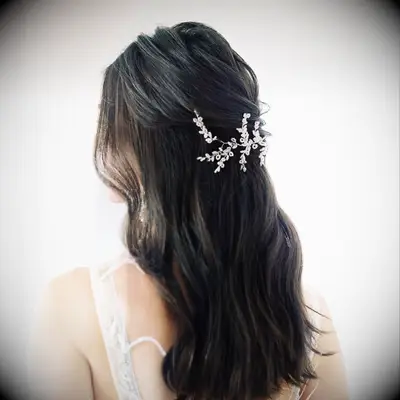 Half-up wedding day hairstyle for medium length hair