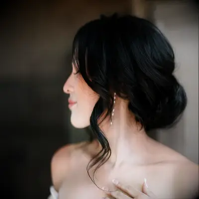 Wispy updo medium length wedding hairstyle