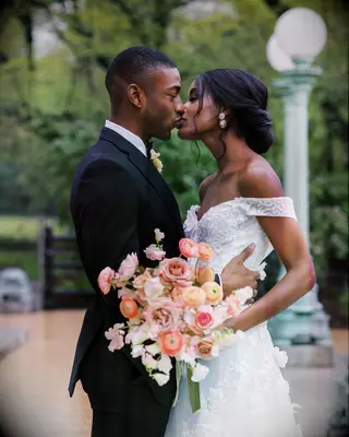 Bride with twisted updo medium length wedding hairstyle