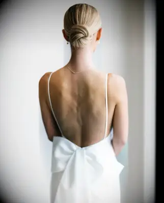 Sleek, smooth wedding updo for medium length hair