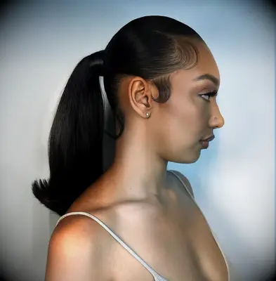 Sleek ponytail medium length wedding hairstyle