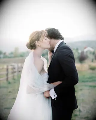 Low bun with bangs wedding hairstyle