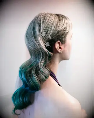 Glamorous waves with bangs wedding hairstyle