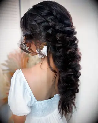 Fishtail braid with bangs wedding hairstyle