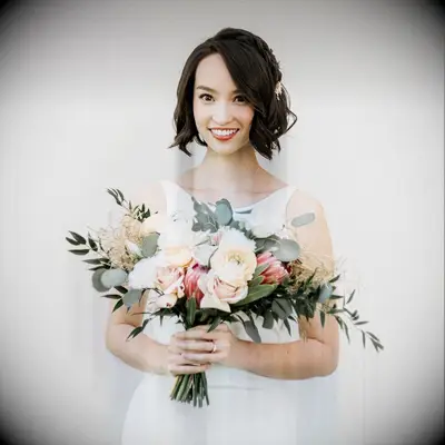 Beach bob with bangs wedding hairstyle