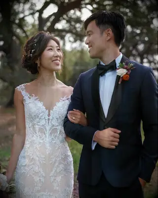 Romantic updo with side bangs wedding hairstyle