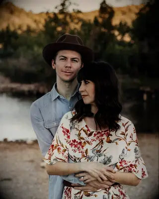 Blunt bangs and beachy waves wedding hairstyle