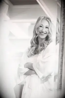 Loose and wavy half-updo