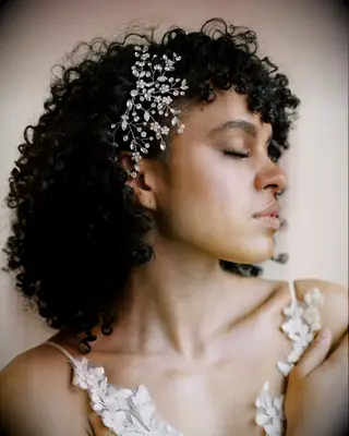 Defined curls thin wedding hairstyle