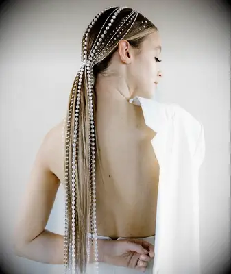 Pear string thin wedding hairstyle ponytail