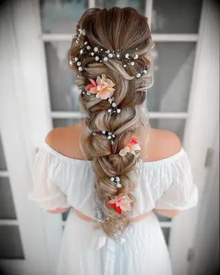 Floral embellished braid thin wedding hairstyle