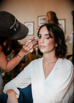 Bride getting her makeup done
