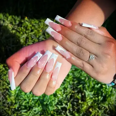 Long acrylic pearl embellished wedding nails 