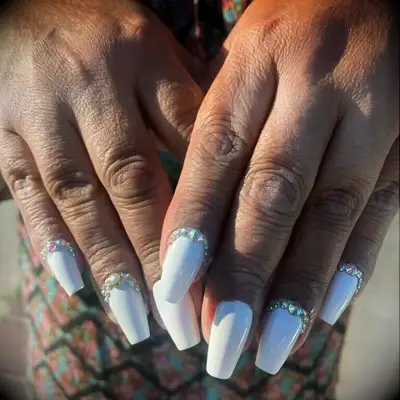 Bedazzled white wedding nails