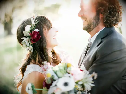 Burgundy ranunculus and succulent flower crown