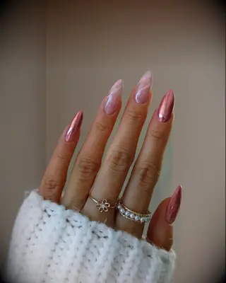 Stiletto bridesmaid nails with pink glitter and chrome