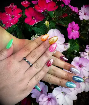 Rainbow colored chrome bridesmaid nails