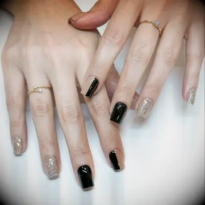 Black and gold bachelorette nails