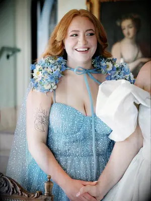 Curled hair with curtain bangs