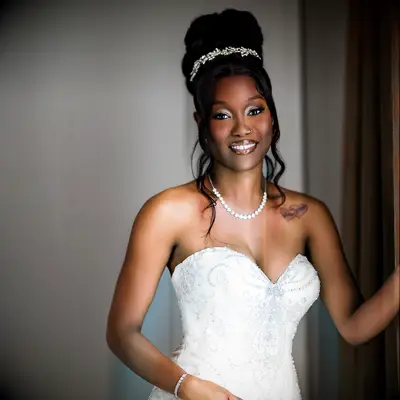 Beehive Bun strapless wedding dress hairstyle