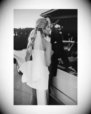 Voluminous High Fashion Pony strapless wedding dress hairstyle