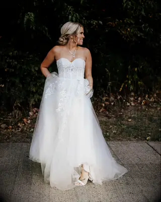 Messy Dutch Braid Bun strapless wedding dress hairstyle