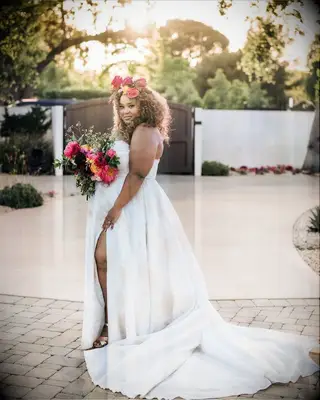 Bold Floral Headpiece strapless wedding dress hairstyle