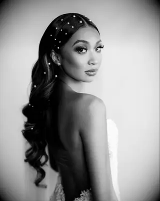 Sleek, Pearl-Adorned Waves strapless wedding dress hairstyle