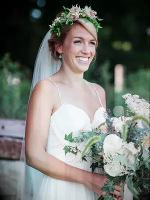 Blushing bride flower crown with a long wedding veil